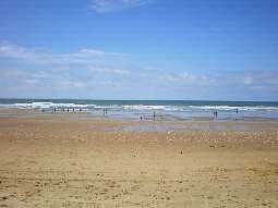 La plage de Le-Grand-Village-Plage au mois d'août